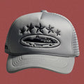 Corteiz Vintage Grey Trucker Hat with Black Stars and Cruise Ship Graphic
