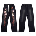 Hellstar Vintage Faded Black Red‑Outline Flame Graphic Wide‑Leg Sweatpants